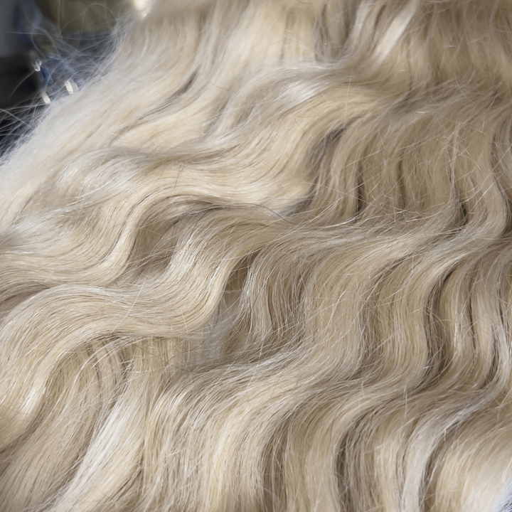 Close up of raw Blonde 613 Wavy Bundles - Bundles and Drops of Glam